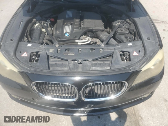 2012 BMW 7 Series 740i with VIN WBAKA4C56CC613745, listed as a Copart auction lot 57342795 with 139,889 mi miles and Clean title. Bid and sale history available at DreamBid. Image 11.