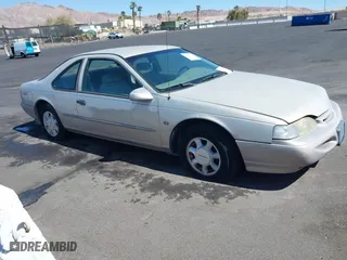 1995 Ford Thunderbird LX with VIN 1FALP62W4SH127020, listed as a IAAI auction lot 41823705 with 199,600 mi miles. Bid and sale history available at carsss.com. Image 1.