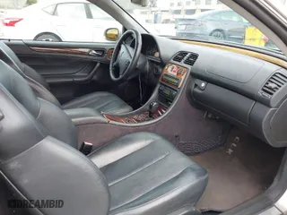 2003 Mercedes-Benz CLK-Class 3.2L with VIN WDBLK65G13T138714, listed as a IAAI auction lot 41667330 with 235,314 mi miles. Bid and sale history available at carsss.com. Image 5.