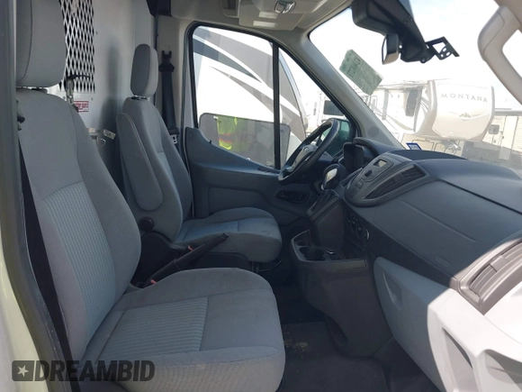 2016 Ford Transit Cargo z VIN 1FTYR3XM6GKB25327, wystawiony jako IAAI lot #42468273 z przebiegiem 137 976 mil mil oraz . Historia ofert i sprzedaży dostępna na DreamBid. Obrazek 5.
