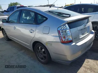 2007 Toyota Prius with VIN JTDKB20U777574498, listed as a IAAI auction lot 42204912 with 302,866 mi miles and . Bid and sale history available at DreamBid. Image 3.