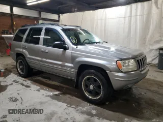 2001 Jeep Grand Cherokee Limited with VIN 1J4GW58N91C664611, listed as a Copart auction lot 53330755 with 212,479 mi miles and Salvage Title. Bid and sale history available at carsss.com. Image 4.