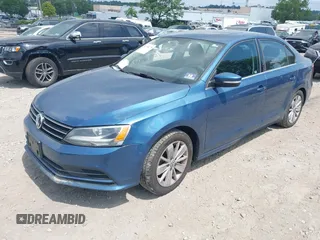 2015 Volkswagen Jetta SE with VIN 3VWD17AJ6FM231597, listed as a IAAI auction lot 42718275 with Not provided miles and . Bid and sale history available at DreamBid. Image 2.