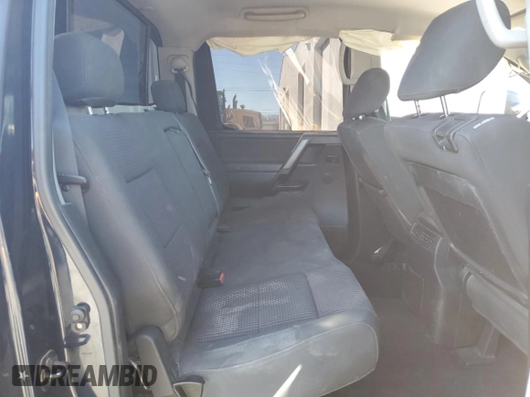2010 Nissan Titan LE with VIN 1N6AA0EC5AN314233, listed as a Copart auction lot 84234574 with 175,110 mi miles and Salvage Title. Bid and sale history available at carsss.com. Image 10.