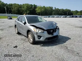 2015 Mazda CX-5 Grand Touring with VIN JM3KE4DY8F0540181, listed as a Copart auction lot 70624394 with 119,420 mi miles and Salvage Title. Bid and sale history available at carsss.com. Image 12.
