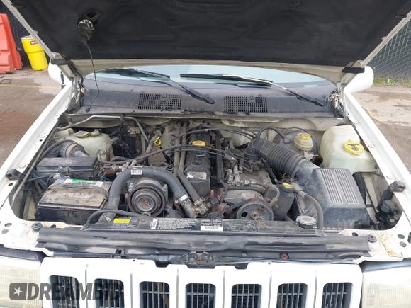 1997 Jeep Grand Cherokee Limited z VIN 1J4GZ78S1VC536295, wystawiony jako IAAI lot #42435292 z przebiegiem 310 005 mil mil oraz . Historia ofert i sprzedaży dostępna na DreamBid. Obrazek 10.