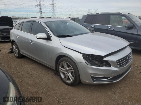 2015 Volvo V60 T5 Drive-E Premier with VIN YV140MEKXF1242830, listed as a Copart auction lot 83890754 with 138,563 mi miles and Salvage Title. Bid and sale history available at carsss.com. Image 4.