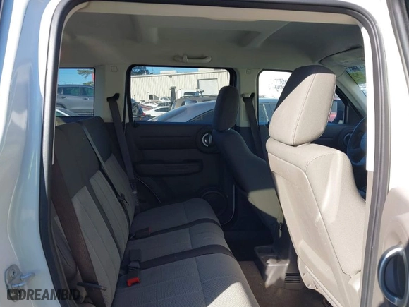 2007 Dodge Nitro SXT with VIN 1D8GT28KX7W591146, listed as a IAAI auction lot 41334481 with 88,459 mi miles. Bid and sale history available at carsss.com. Image 8.