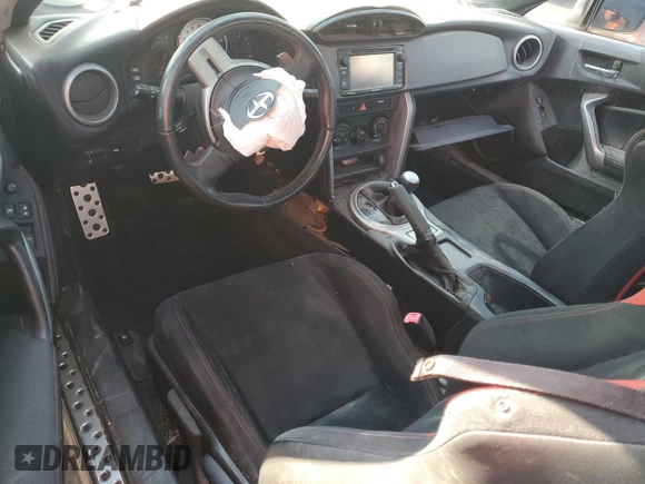 2015 Scion FR-S z VIN JF1ZNAA15F8712221, wystawiony jako Copart lot #58330515 z przebiegiem 108 646 mil mil oraz Szkoda całkowita • Salvage title. Historia ofert i sprzedaży dostępna na DreamBid. Obrazek 8.
