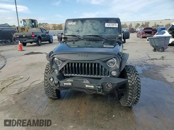2017 Jeep Wrangler Willys Wheeler with VIN 1C4AJWAG1HL624254, listed as a Copart auction lot 42678975 with 51,936 mi miles and Salvage Title. Bid and sale history available at DreamBid. Image 14.