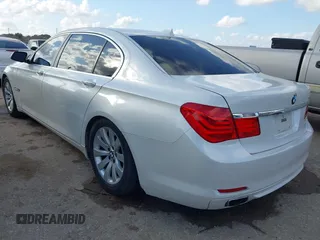 2011 BMW 7 Series 750Li with VIN WBAKB8C57BCY66558, listed as a IAAI auction lot 41494697 with 102,560 mi miles. Bid and sale history available at carsss.com. Image 3.