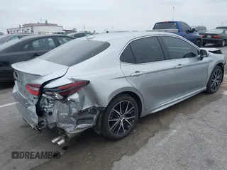 2023 Toyota Camry SE with VIN 4T1G11AKXPU809876, listed as a IAAI auction lot 42100546 with 35,055 mi miles and . Bid and sale history available at DreamBid. Image 4.
