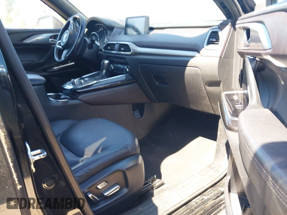 2018 Mazda CX-9 Grand Touring z VIN JM3TCBDY2J0237050, wystawiony jako IAAI lot #42457060 z przebiegiem 130 625 mil mil oraz . Historia ofert i sprzedaży dostępna na DreamBid. Obrazek 5.