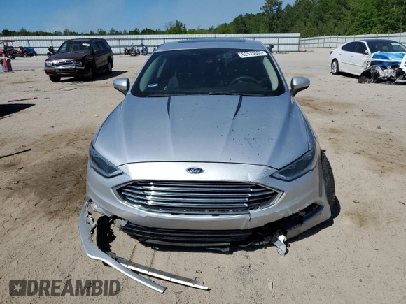 2017 Ford Fusion SE z VIN 3FA6P0HD7HR184691, wystawiony jako Copart lot #52515085 z przebiegiem 113 275 mil mil oraz Szkoda całkowita • Salvage title. Historia ofert i sprzedaży dostępna na DreamBid. Obrazek 5.