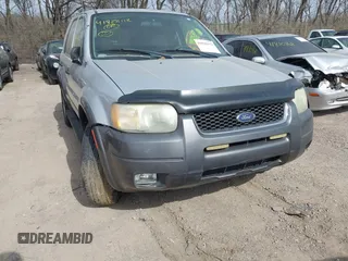 2003 Ford Escape XLT Popular 2 with VIN 1FMYU93163KC74842, listed as a IAAI auction lot 41828112 with 171,988 mi miles. Bid and sale history available at carsss.com. Image 6.