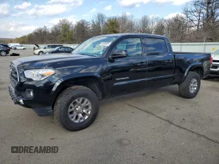 2016 Toyota Tacoma SR5 with VIN 3TMDZ5BN2GM002949, listed as a Copart auction lot 43263985 with 136,748 mi miles and Salvage Title. Bid and sale history available at DreamBid. Image 1.