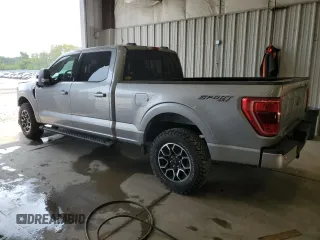2021 Ford F-150 XL with VIN 1FTFW1E85MKE03933, listed as a Copart auction lot 60513185 with 82,793 mi miles and Salvage title. Bid and sale history available at DreamBid. Image 2.