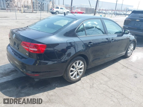 2015 Volkswagen Jetta SE z VIN 3VWD17AJXFM259306, wystawiony jako IAAI lot #42418042 z przebiegiem 199 780 mil mil oraz . Historia ofert i sprzedaży dostępna na DreamBid. Obrazek 4.