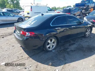 2009 Acura TSX with VIN JH4CU26659C011482, listed as a IAAI auction lot 42212079 with 243,119 mi miles. Bid and sale history available at carsss.com. Image 4.