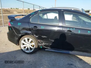2014 Mitsubishi Lancer Ralliart with VIN JA32V6FVXEU005172, listed as a IAAI auction lot 41983895 with 70,584 mi miles and . Bid and sale history available at DreamBid. Image 6.