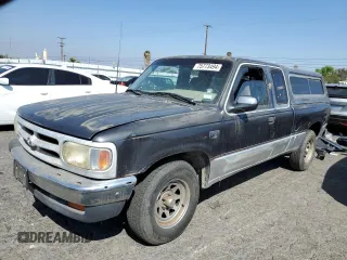 1994 Mazda B-Series Truck LE with VIN 4F4CR16X1RTM70456, listed as a Copart auction lot 75773494 with 156,442 mi miles and Clean Title. Bid and sale history available at DreamBid. Image 1.