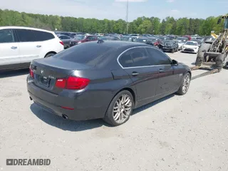 2011 BMW 5 Series 535i xDrive with VIN WBAFU7C58BC877235, listed as a IAAI auction lot 41684559 with 130,465 mi miles. Bid and sale history available at carsss.com. Image 4.