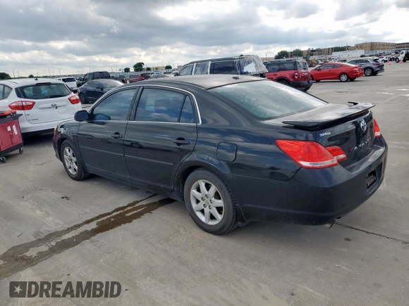 2010 Toyota Avalon XL with VIN 4T1BK3DB2AU360201, listed as a Copart auction lot 54443575 with 220,759 mi miles and Clean Title. Bid and sale history available at carsss.com. Image 2.