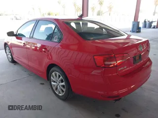 2015 Volkswagen Jetta Sedan 1.8T SE with VIN 3VWD17AJ8FM297813, listed as a IAAI auction lot 42114550 with 126,229 mi miles. Bid and sale history available at carsss.com. Image 3.