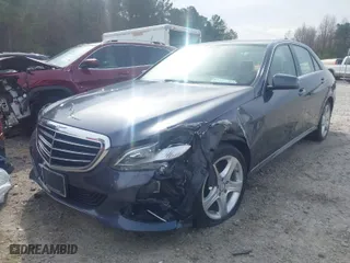 2014 Mercedes-Benz E-Class E 350 Luxury with VIN WDDHF8JB8EA917064, listed as a IAAI auction lot 41742771 with 132,619 mi miles. Bid and sale history available at carsss.com. Image 2.