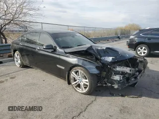 2015 BMW 7 Series 750Li with VIN WBAYE8C59FD781898, listed as a Copart auction lot 48712885 with 0 mi miles and Salvage Title. Bid and sale history available at carsss.com. Image 4.