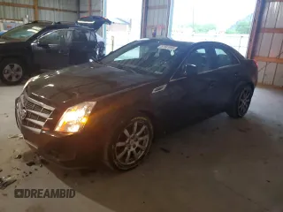 2009 Cadillac CTS RWD z VIN 1G6DF577590169740, wystawiony jako Copart lot #57041055 z przebiegiem 68 857 mil mil oraz Szkoda całkowita • Salvage title. Historia ofert i sprzedaży dostępna na DreamBid. Obrazek 1.