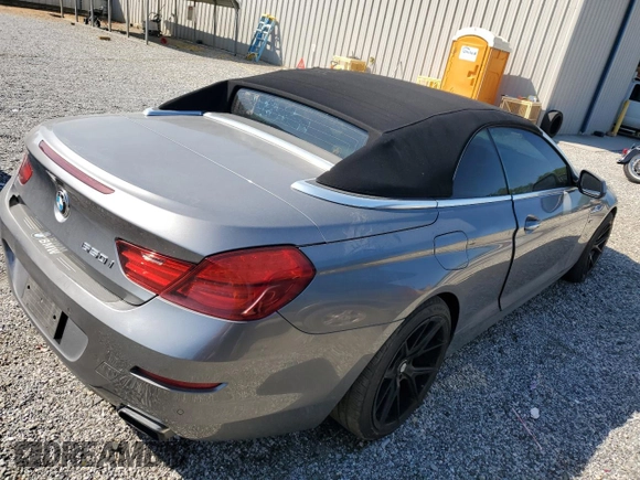 2012 BMW 6 Series z VIN WBALZ5C50CDW99700, wystawiony jako Copart lot #54983705 z przebiegiem Nie podano mil oraz Czysty tytuł • Clean title. Historia ofert i sprzedaży dostępna na DreamBid. Obrazek 3.