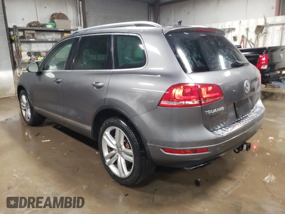 2013 Volkswagen Touareg Lux with VIN WVGEF9BP6DD002607, listed as a Copart auction lot 83420704 with 143,571 mi miles and Salvage Title. Bid and sale history available at DreamBid. Image 2.