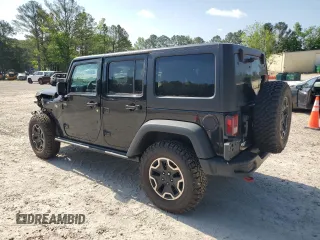 2016 Jeep Wrangler Unlimited Rubicon Hard Rock z VIN 1C4BJWFG6GL125252, wystawiony jako Copart lot #55241115 z przebiegiem 193 554 mil mil oraz Szkoda całkowita • Salvage title. Historia ofert i sprzedaży dostępna na DreamBid. Obrazek 2.