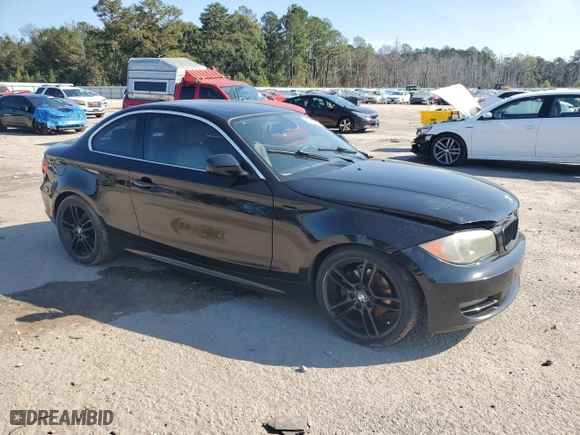 2011 BMW 1 Series 128i with VIN WBAUP7C51BVP21802, listed as a Copart auction lot 79502794 with 126,976 mi miles and Salvage Title. Bid and sale history available at carsss.com. Image 4.