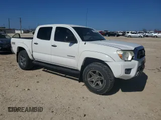 2014 Toyota Tacoma PreRunner with VIN 3TMJU4GN7EM159880, listed as a Copart auction lot 43932065 with 125,564 mi miles and Salvage Title. Bid and sale history available at carsss.com. Image 4.