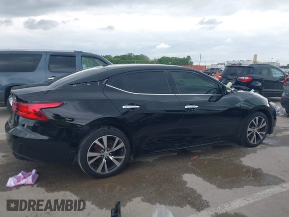 2017 Nissan Maxima Platinum z VIN 1N4AA6AP4HC403592, wystawiony jako IAAI lot #42177002 z przebiegiem 112 105 mil mil oraz . Historia ofert i sprzedaży dostępna na DreamBid. Obrazek 14.