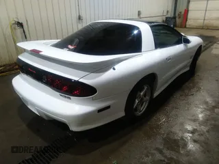 1998 Pontiac Firebird Formula with VIN 2G2FV22GXW2225829, listed as a IAAI auction lot 39732377 with 1 mi miles. Bid and sale history available at carsss.com. Image 4.