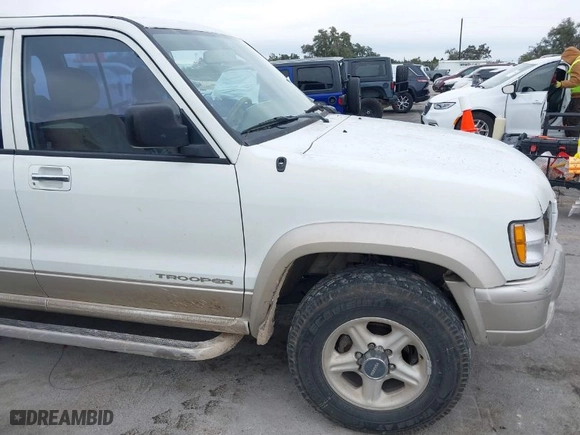 2000 Isuzu Trooper S with VIN JACDJ58X5Y7J16678, listed as a IAAI auction lot 41596957 with 208,373 mi miles. Bid and sale history available at carsss.com. Image 12.