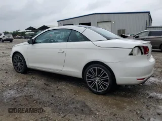 2013 Volkswagen Eos Komfort with VIN WVWBW8AH0DV003581, listed as a Copart auction lot 54498655 with 95,203 mi miles and Salvage Title. Bid and sale history available at DreamBid. Image 2.