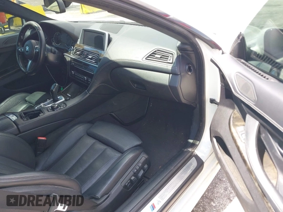 2014 BMW 6 Series 650i with VIN WBAYM9C55ED248244, listed as a IAAI auction lot 42043456 with 144,664 mi miles and . Bid and sale history available at DreamBid. Image 5.