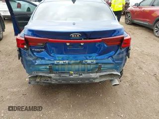 2021 Kia Forte LXS with VIN 3KPF24AD0ME288497, listed as a IAAI auction lot 41888110 with 71,646 mi miles and . Bid and sale history available at DreamBid. Image 6.
