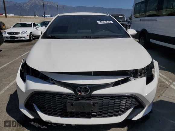 2022 Toyota Corolla Hatchback SE with VIN JTND4MBE5N3148944, listed as a Copart auction lot 52324435 with 55,206 mi miles and Salvage Title. Bid and sale history available at carsss.com. Image 5.