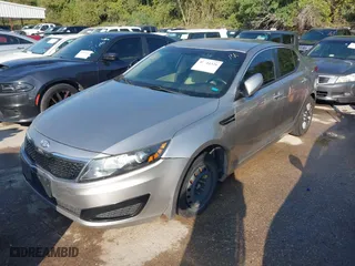 2011 Kia Optima LX with VIN KNAGM4A75B5127965, listed as a IAAI auction lot 40544326 with 207,760 mi miles. Bid and sale history available at carsss.com. Image 2.