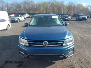 2020 Volkswagen Tiguan SE with VIN 3VV2B7AX2LM017277, listed as a IAAI auction lot 42075052 with 72,248 mi miles and . Bid and sale history available at DreamBid. Image 12.