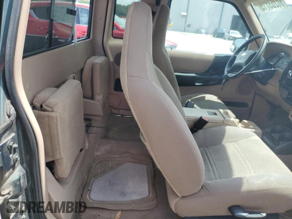 2002 Ford Ranger XLT Appearance with VIN 1FTYR44E42TA32828, listed as a Copart auction lot 60205715 with 290,846 mi miles and Salvage title. Bid and sale history available at DreamBid. Image 10.