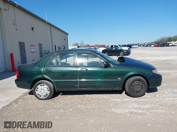 2001 Mazda Protege LX with VIN JM1BJ225310404647, listed as a IAAI auction lot 41480466 with 115,606 mi miles and . Bid and sale history available at carsss.com. Image 13.