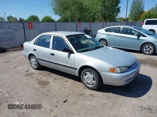 2001 Chevrolet Prizm z VIN 1Y1SK52801Z400930, wystawiony jako IAAI lot #42176390 z przebiegiem 258 356 mil mil oraz . Historia ofert i sprzedaży dostępna na DreamBid. Obrazek 1.