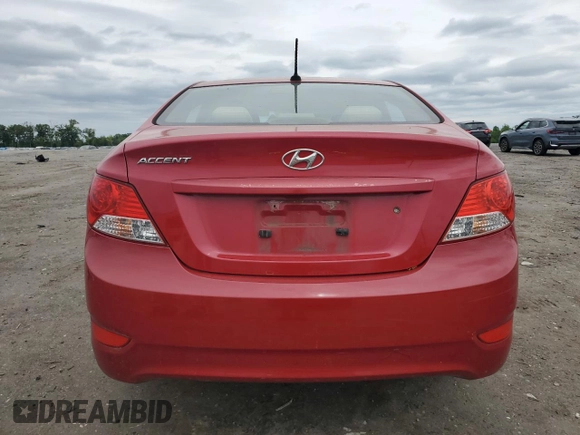 2012 Hyundai Accent GLS z VIN KMHCU4AE1CU270091, wystawiony jako Copart lot #56623905 z przebiegiem 185 477 mil mil oraz Szkody całkowita. Historia ofert i sprzedaży dostępna na DreamBid. Obrazek 6.