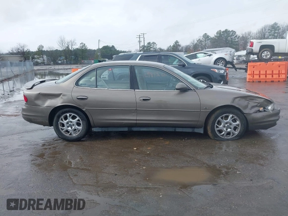 2000 Oldsmobile Intrigue GLS z VIN 1G3WX52H9YF131166, wystawiony jako IAAI lot #41527895 z przebiegiem 104 534 mil mil oraz . Historia ofert i sprzedaży dostępna na DreamBid. Obrazek 13.